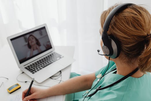 image of a doctor consulting with a patient via telemedicine