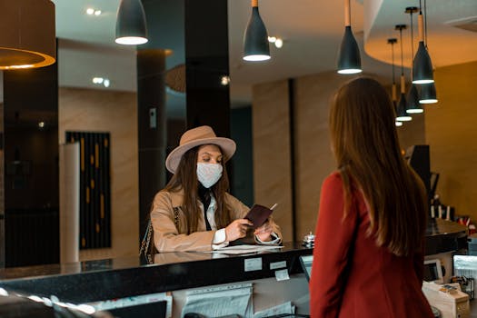 image of a hotel lobby with guests checking in